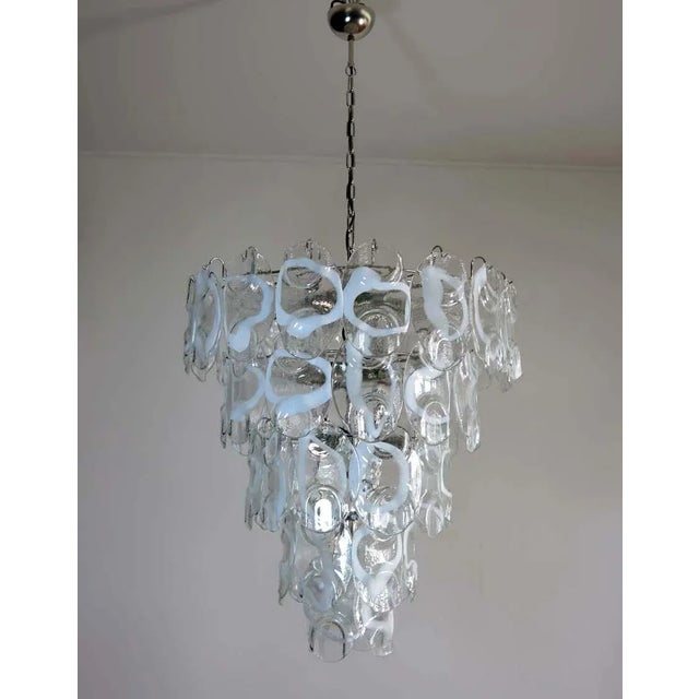 Huge vintage italian murano chandelier in vistosi style. The chandelier has 50 fantastic murano white and transparent...