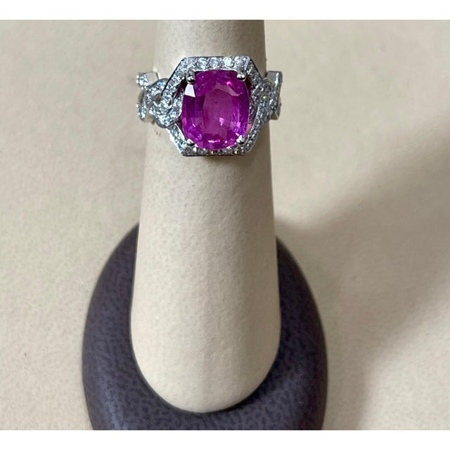 Gia certified pink sapphire Report # 2235487998 A classic, Ring Exact weight of 4.76 Ct natural Pink sapphire and 1.2 ct...