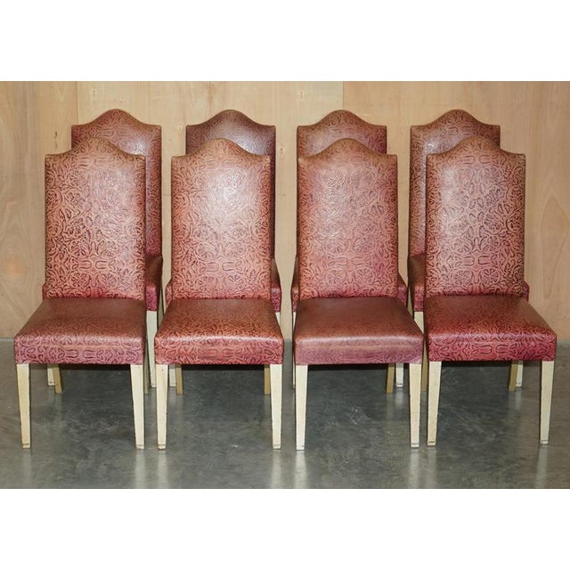 The leather is hand dyed, embossed hide, the frames have an antique French style painted finish This set has been cleaned...