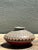 This exquisite vintage studio pottery vase is a masterclass in textural design and geometric precision. Featuring a...