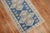 Mid 20th century turkish runner in denim blue, accents in beige and off white