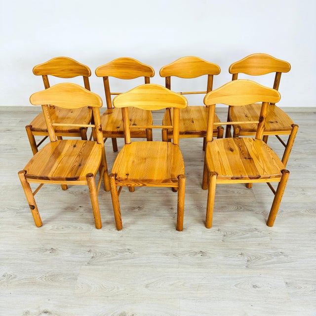 Dimensions: H 35” x W 18.5” x SD 18” x SH 18.5” Set of 7 Brutalist dining chairs in solid pine attr. to Rainer Daumiller,...