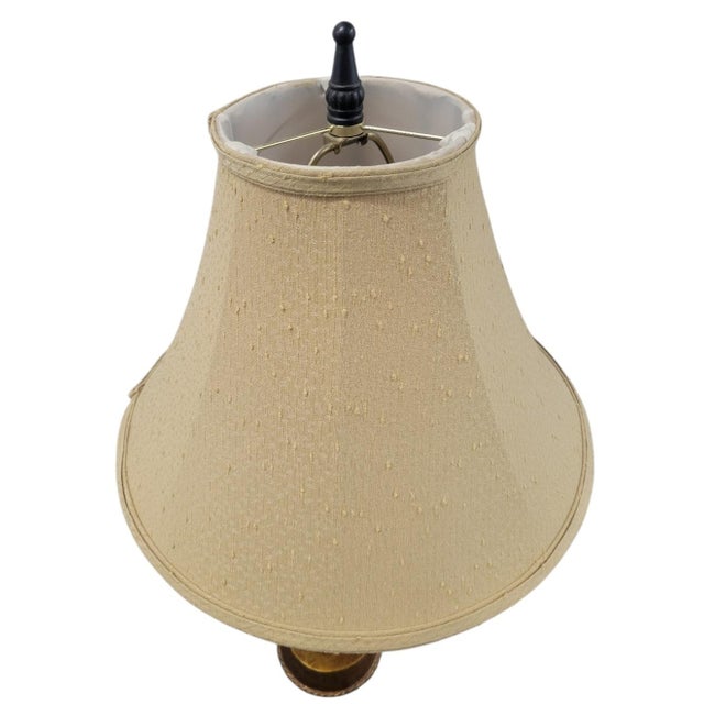 Vintage Chelsea House palm tree tortoiseshell sitting monkey table lamp. The lamp features a tortoiseshell finish on the...