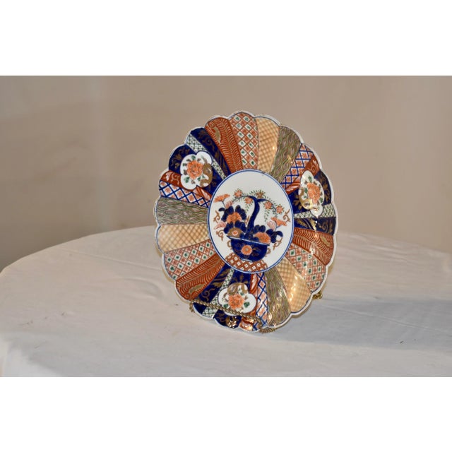 19th century Imari charger with exquisitely hand painted patterns in lovely colors. There is a central medallion, which...