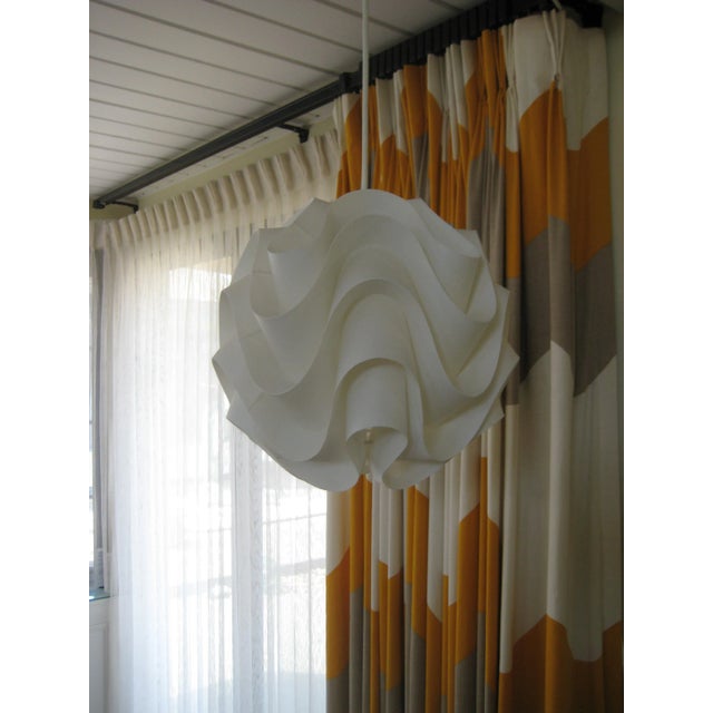 This is a period piece from circa 1970s, in the house since then, always elegant and fascinating this kind of chandelier...