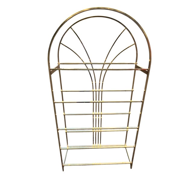 Vintage Postmodern Brass Étagère Bookcase Make a dramatic statement with this striking vintage postmodern étagère, crafted...