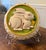This is a charming vintage ceramic jello mold, prominently featuring a raised relief design of a white bunny with...