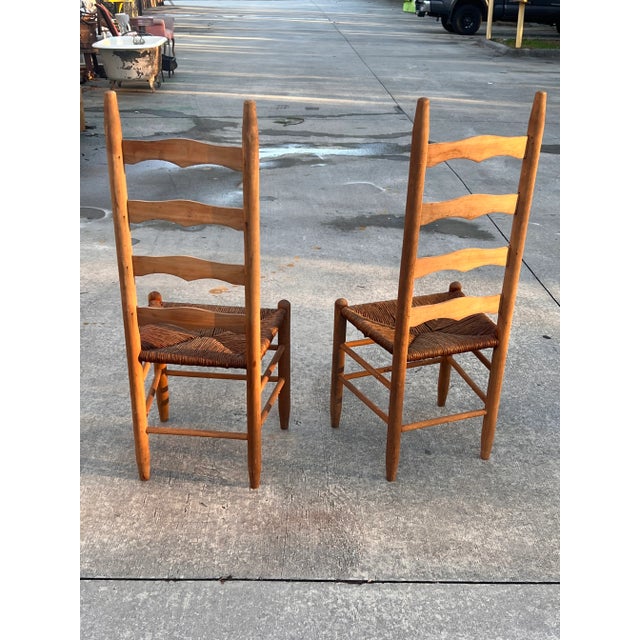 A pair of authentic ladder back chairs. If you're looking for a rustic, authentic pair of antique chairs then these are...