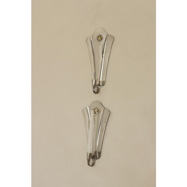 An amazing pair of mid century Swedish Pewter Sconces wall sconces Both sconces are in good condition with some age...