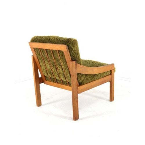 A freestanding designer armchair in a Scandinavian style. This pine chair, with its beautiful, trendy new Doodle Army...