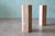 A pair of travertine hexagonal end tables. Considerable height so these could be used as minimalist night stands, end...