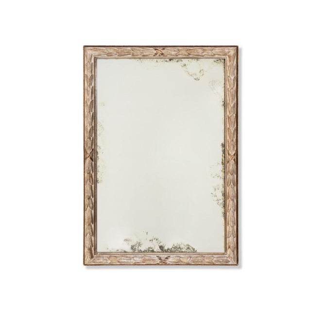 Michael Taylor vintage mirror. Hand carved acanthus leaf with French influences. Original aged painted finish and aged glass.