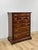 This handsome vintage American Drew five drawer tallboy dresser is a well-crafted and practical bedroom storage find....
