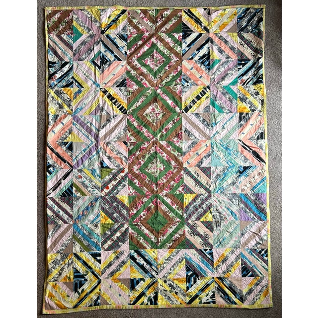 Vintage handmade patchwork cotton quilt with flannel backing. Perfect condition. Measures 88” x 62”.