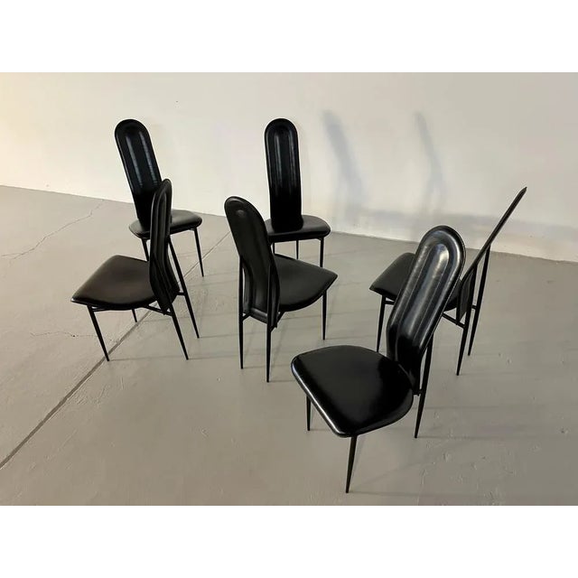 These elegant chairs are attributed to the Fasem company. The rounded backrest is a distinctive feature and, in my...
