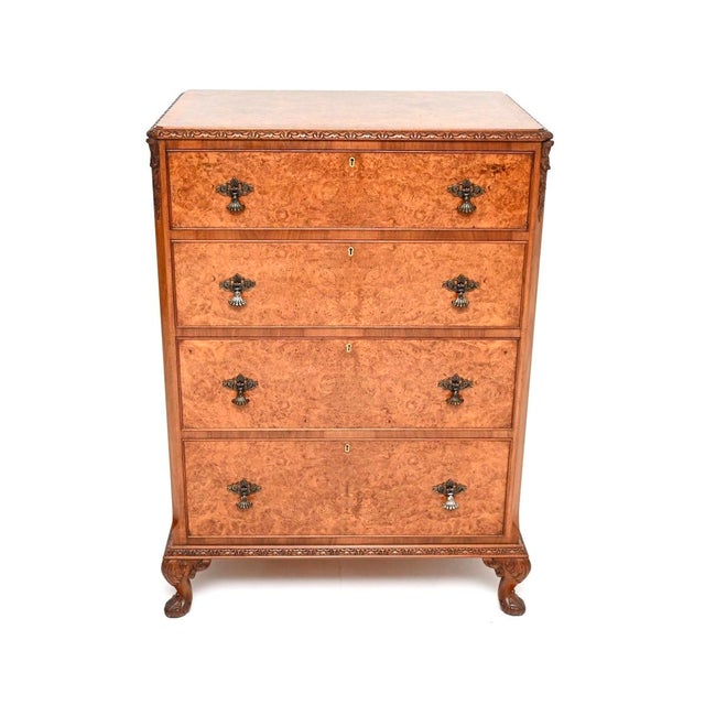 A stunning antique burr walnut chest of drawers of the highest order. This was made in England, it dates from around the...