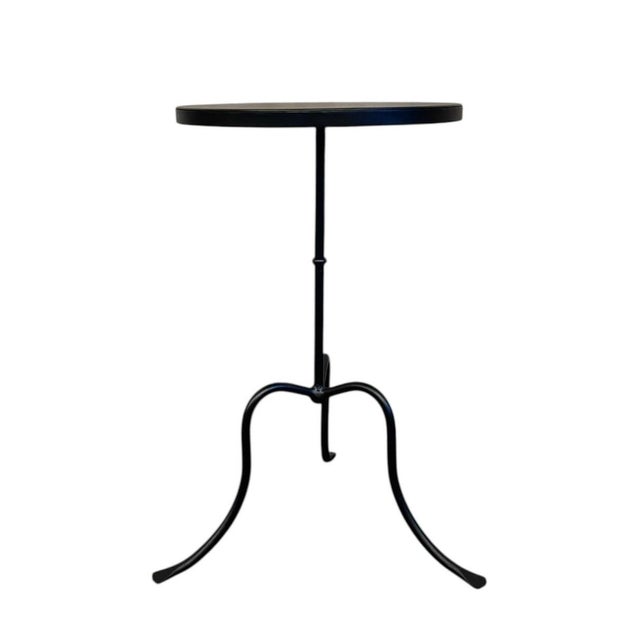 This 21th Century French cast iron bistro table with an iron top captures the charm and durability of classic café...
