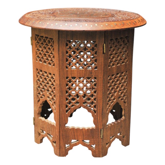 Antique Middle Eastern Circular Carved Table with Repetitive Brass Floral Patterns, 1890s For Sale