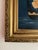 A richly toned maritime seascape set against a deep navy sky, with water in layered blues, creating a sense of depth and...