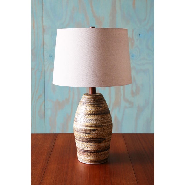 A highly collectable pair of lamps designed by Jane and Gordon Martz of Marshall Studios in Veedersburg Indiana circa...