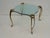 Brass and glass coffee / side / end table in the manner of Maison Jansen with beautiful Rococo style legs and unique shape...