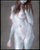 This artwork presents a figure rendered in a delicate interplay of color and light, showcasing the human form with a soft,...