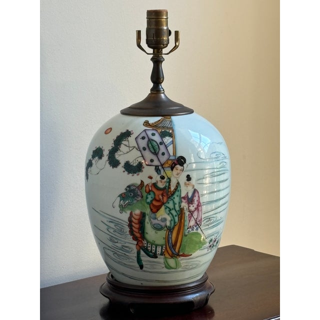 Offering a gorgeous early- to mid-20th century Chinese porcelain ginger jar lamp of bulbous form and with traditional...