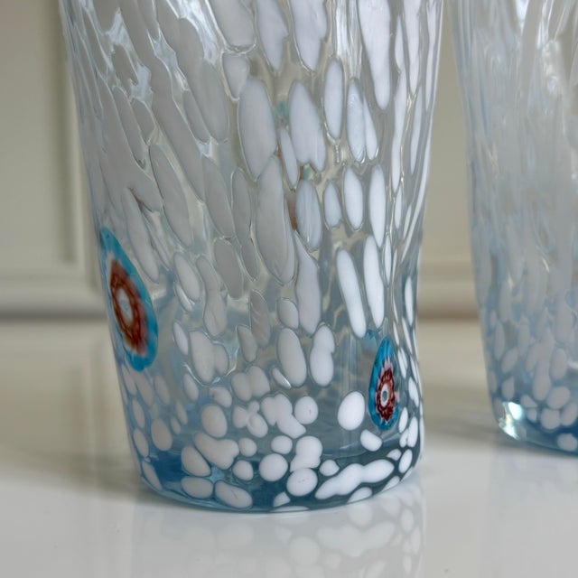 A contemporary homage to the traditional Murano 'Goto' glass. Handcrafted in Murano, Italy, each tumbler showcases the...