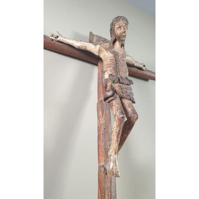 Romanesque Christ of the 17th century carved in fruit wood with posterior cross. It has remains of the original...