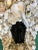 Black Mermaid Wall Sconce covered in White Shells