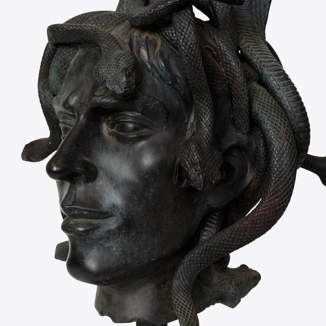 Our intricately detailed bust of Medusa features life-like snakes and strikingly lifelike face. Made from polyresin with a...