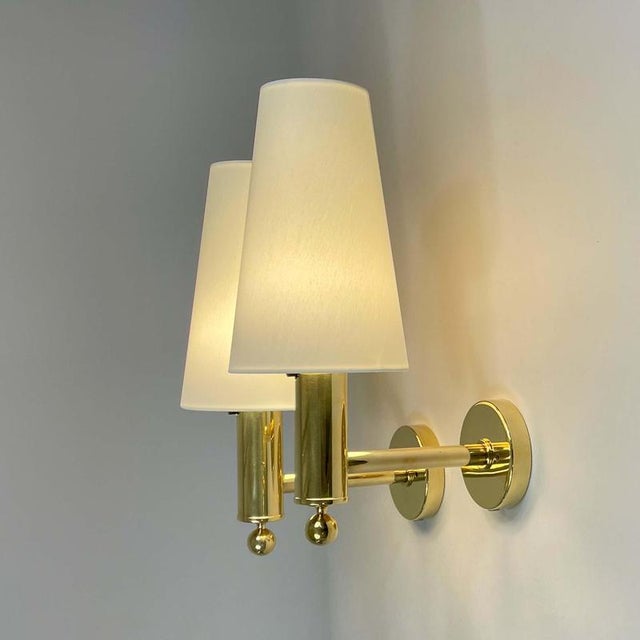 These mid-century sconces were designed and manufactured in sweden by bergboms in the 1960s. The lights feature an elegant...