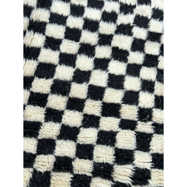 This soft Beni Ourain rug is a pure beauty. Made from one of the best quality wool of sheep in Morocco. Handmade by Berber...