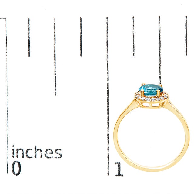 Metal 10K Yellow Gold Blue Topaz and 1/10 Cttw Diamond Halo Ring, Size 6.5 For Sale - Image 7 of 7