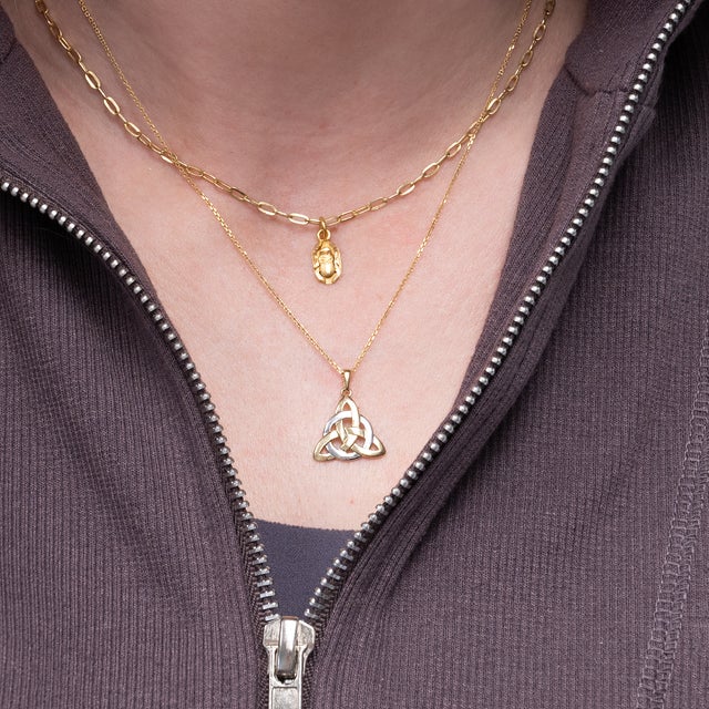 Celebrate Celtic heritage with this beautiful Triquetra pendant crafted in solid 14K gold. Featuring the iconic Trinity...