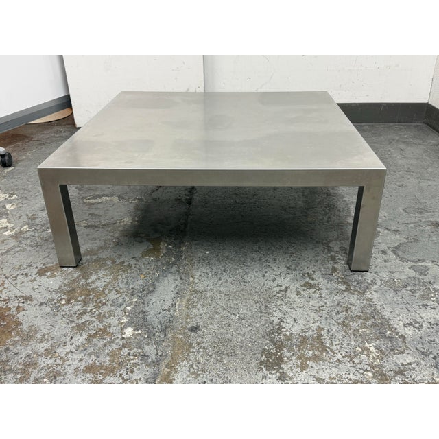 Design Plus Gallery presents a French Stainless Steel Coffee Table in the style of Maria Pergay. The table has a low,...