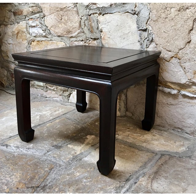 Mid century Ming style rosewood table made in Hong Kong. It is very sturdy & solid and was joined using no hardware.