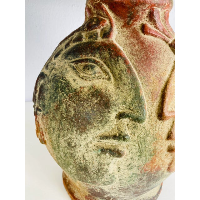 This is a handcrafted, terra-cotta table lamp with an organic modern aesthetic. This lamp features to hand, sculpted...