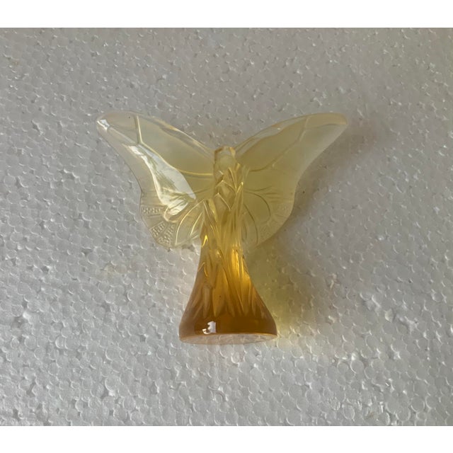 The “Butterfly Rosee” is an exquisite jewel in gold glass; in the original Lalique box.