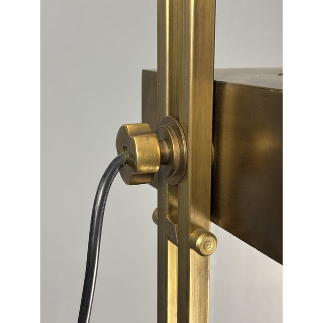 Gorgeous patinated brass Bauhaus floor lamp, design attributed to Marcel Breuer. This floor lamp is in great vintage...