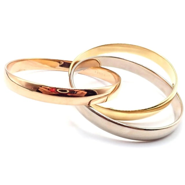 Contemporary 1990s Cartier Trinity Rolling Tricolor Gold Large Model Bangle Bracelet For Sale - Image 3 of 9