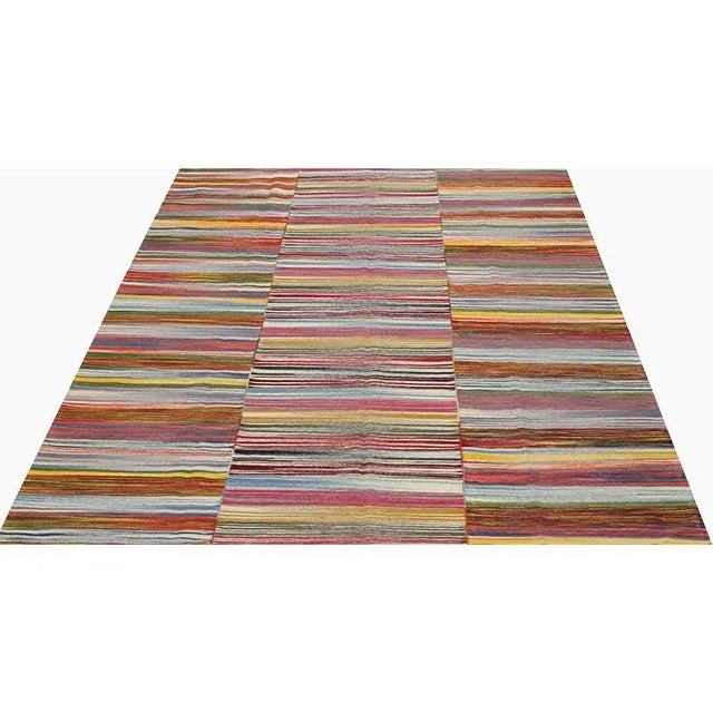 ACTUAL SIZE: 7’3″ x 9’5″ PRIMARY COLOR: Multi AGE: New MATERIALS: Wool FOUNDATION: Cotton PRODUCTION: Handwoven, Flat...
