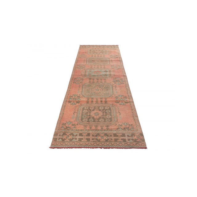 Decorative washed out handknotted vintage rug from Konya region of Turkey. Approximately 50-60 years old. In very good...