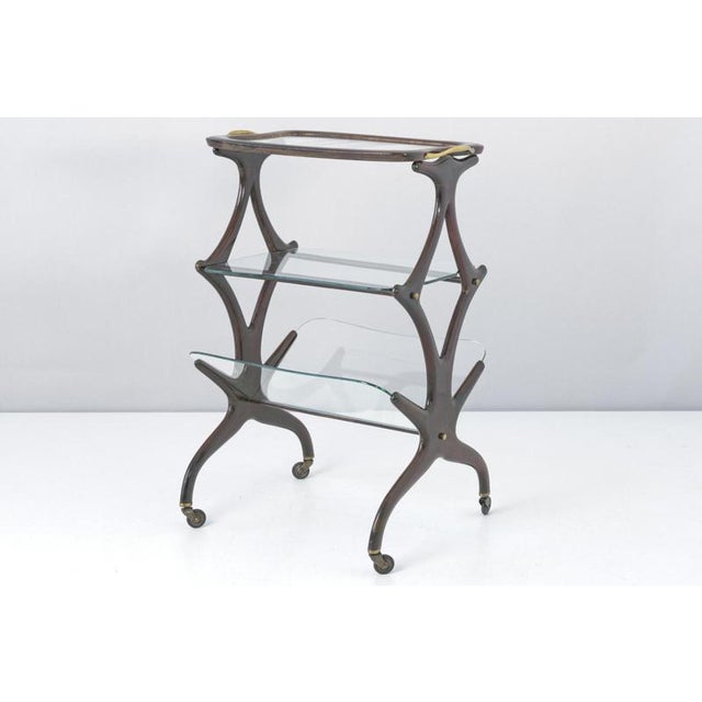 Side Table on Castors Designer: Cesare Lacca Year: around 1955 Manufacturer: Cassina Country: Italy Measurements: H 77 cm,...
