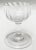An elegant little dessert/jelly glass. Mid-18th century of open cup form on simple stem with folded foot. The molded,...