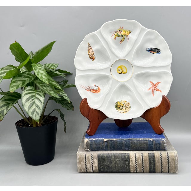 Stunning mid to late 20th century Limoges oyster plate by Jammet-Seignolles, featuring a beautifully scalloped form with...