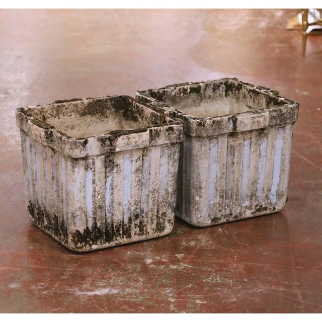 This pair of antique French garden planters was crafted in Normandy circa 1880 and reflects the restrained architectural...