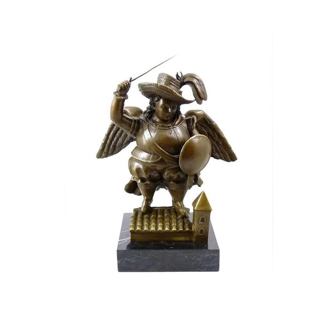 This solid bronze sculpture represents an archangel, reinterpreting a divine figure through the artistic language of...