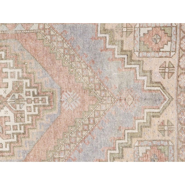 Hand-woven with intricate design and rich colors, this Vintage Turkish Oushak Rug measures 3'8" x 5'10". Made from high-...