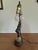 This lovely Art Deco period lamp from Austria featuring the patinated figures of male and female harlequins embraced in a...